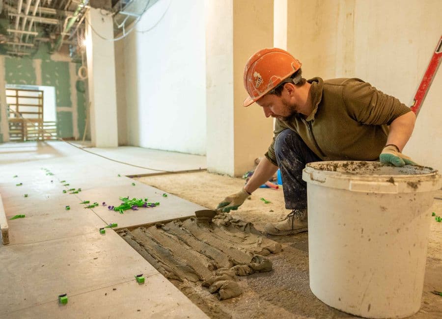 Flooring work on an active construction site