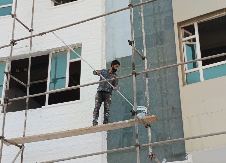 Painting work on an active construction site