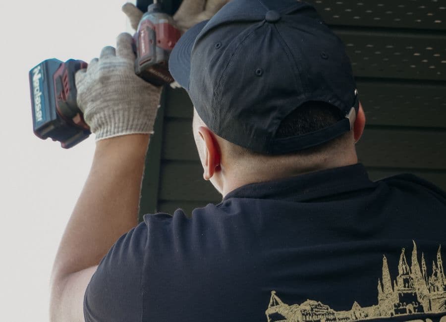Siding work on an active construction site