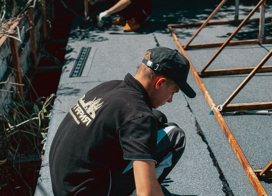 Waterproofing work on an active construction site